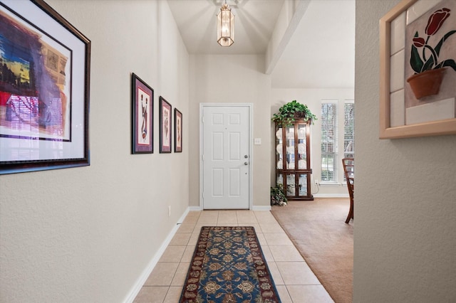 entrance foyer featuring light tile patterned floors