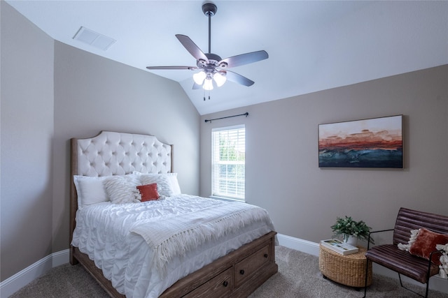 bedroom with ceiling fan, carpet, and vaulted ceiling