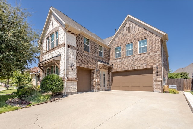 view of front of property with a garage