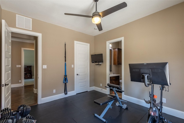 exercise room with ceiling fan