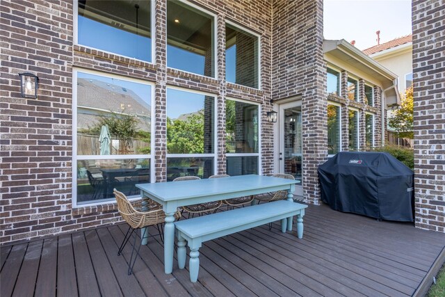 wooden terrace with grilling area