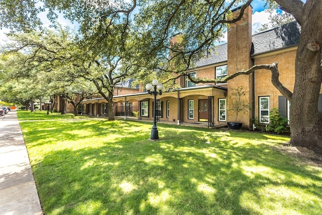 view of front of property with a front lawn