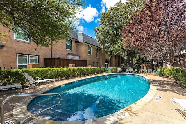 view of pool featuring a patio