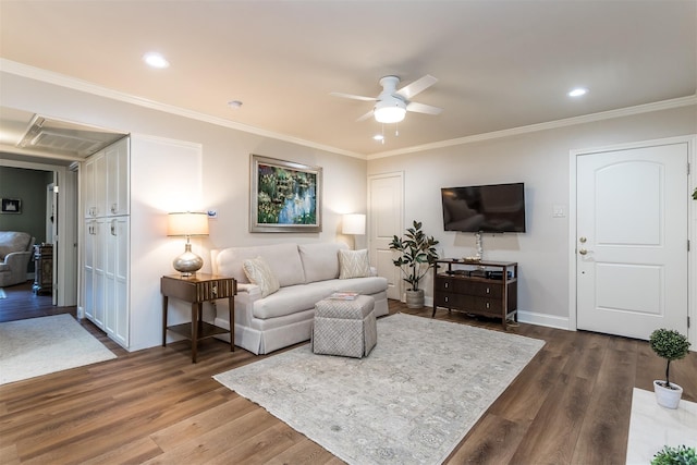 living room featuring ceiling fan, dark wood-type flooring, and crown molding