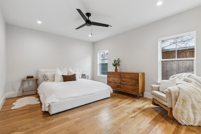 bedroom featuring ceiling fan and wood-type flooring