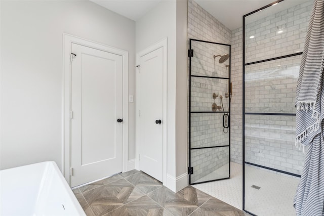 9736 Chiswell Rd, Dallas, TX 75238 - full bath with baseboards, a stall shower, and a freestanding bath