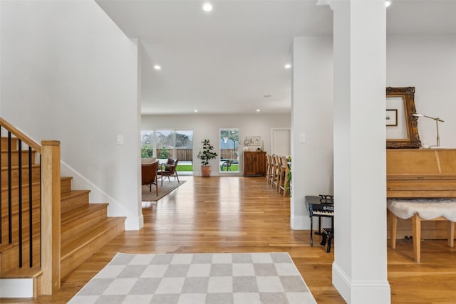 9736 Chiswell Rd, Dallas, TX 75238 - foyer entrance with recessed lighting, light wood finished floors, and stairs