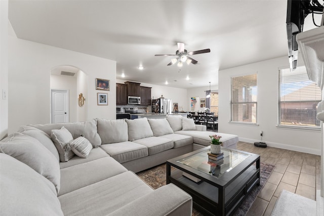 living room with ceiling fan