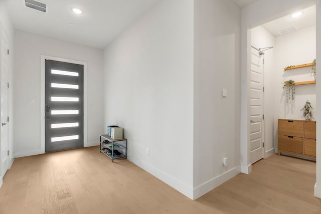 foyer entrance featuring light hardwood / wood-style flooring