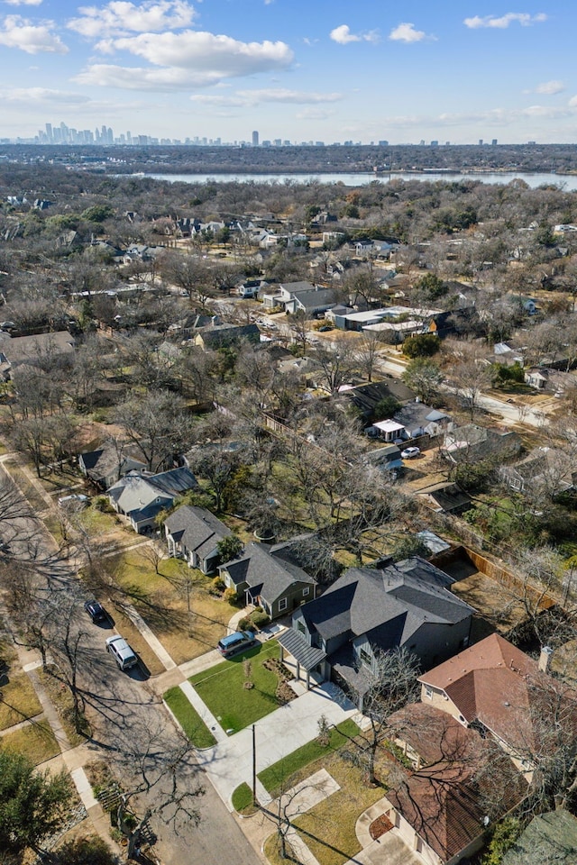 drone / aerial view with a water view