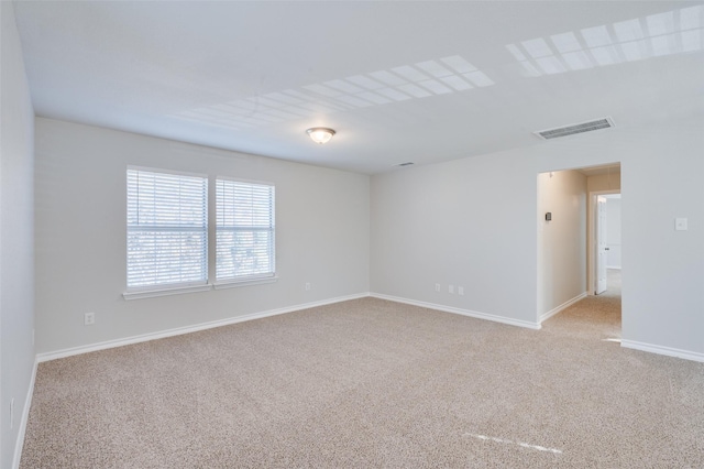 empty room with light carpet