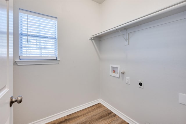 laundry room with washer hookup, hookup for an electric dryer, and hardwood / wood-style floors