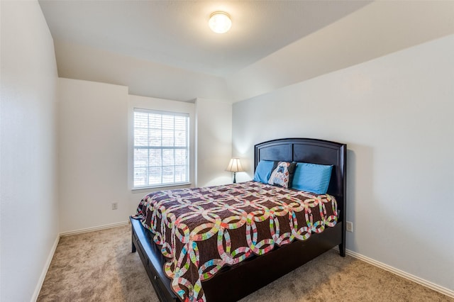 bedroom with light carpet