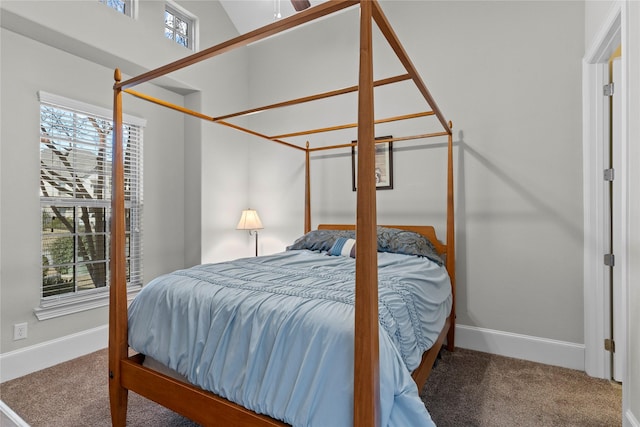 bedroom with carpet and baseboards