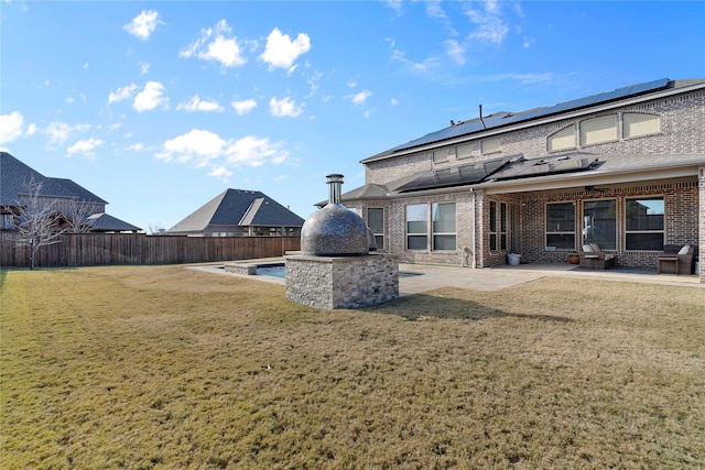 view of yard with a patio area and a fenced backyard