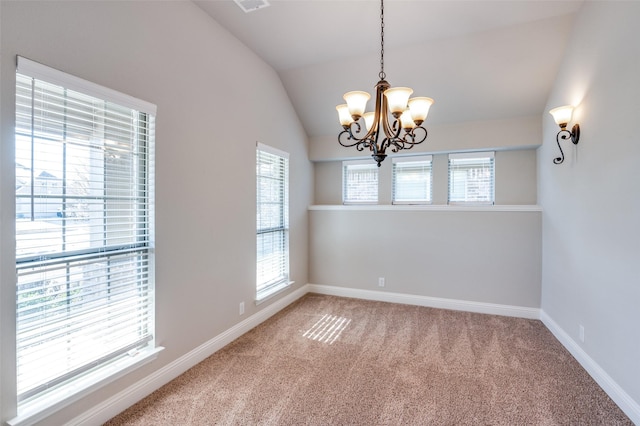 unfurnished room with an inviting chandelier, lofted ceiling, and carpet