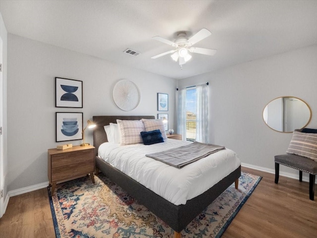 bedroom featuring ceiling fan and hardwood / wood-style floors