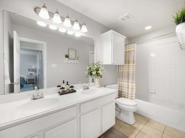 full bathroom with toilet, tile patterned flooring, shower / tub combo, and vanity