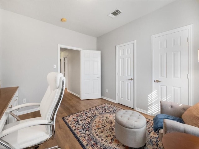 home office featuring hardwood / wood-style floors