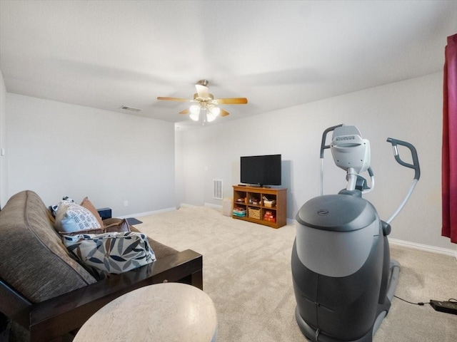 living room featuring ceiling fan and carpet floors