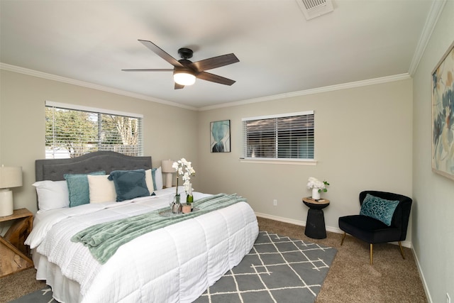 carpeted bedroom with ceiling fan and ornamental molding