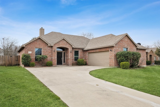 ranch-style home featuring a garage and a front yard