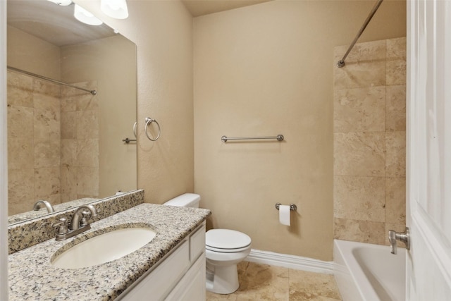 full bathroom with toilet, vanity, and tiled shower / bath