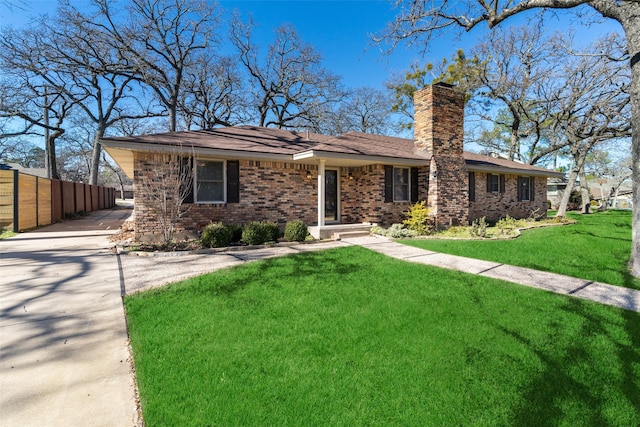 ranch-style house with a front yard