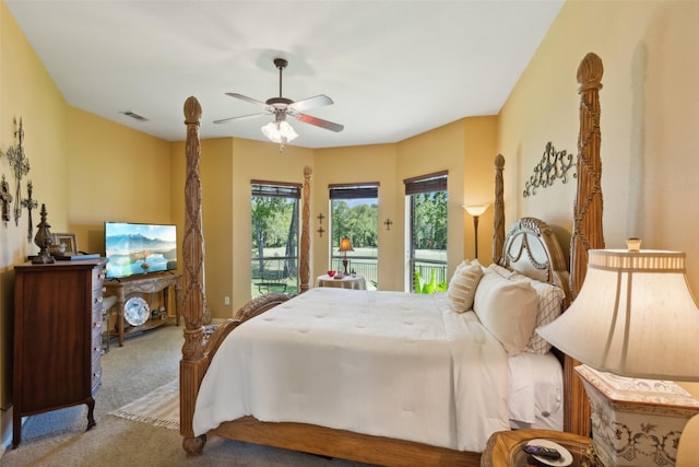 carpeted bedroom featuring access to exterior and ceiling fan