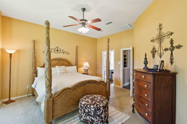 bedroom with ceiling fan, multiple windows, and carpet flooring