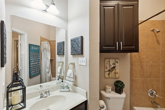 full bathroom with shower / bathtub combination with curtain, vanity, and toilet