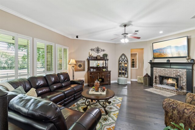 living room with ceiling fan, dark hardwood / wood-style flooring, and crown molding