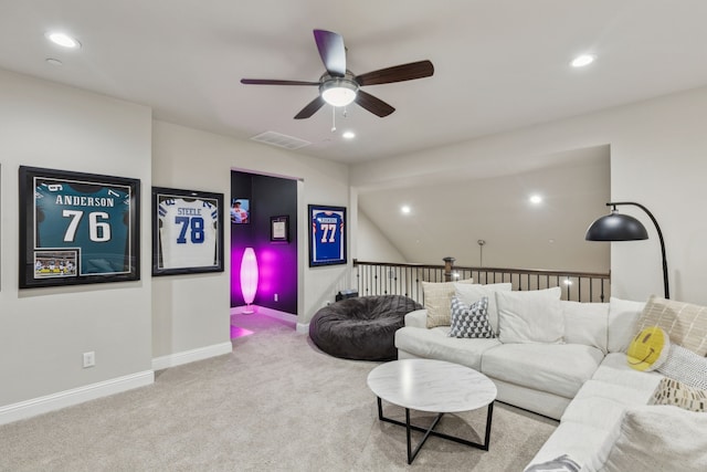 living room with ceiling fan and light carpet