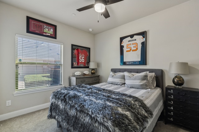 bedroom with ceiling fan and carpet flooring