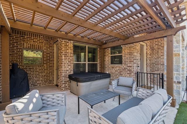 view of patio featuring grilling area, a pergola, outdoor lounge area, and a hot tub