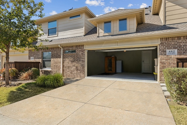 view of front of home featuring a garage