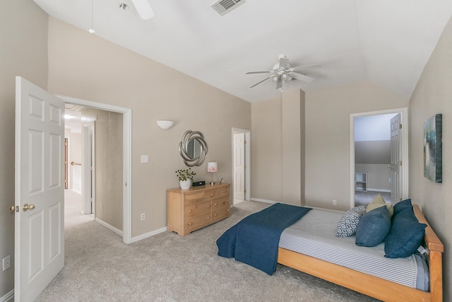 bedroom with vaulted ceiling, ceiling fan, and light carpet