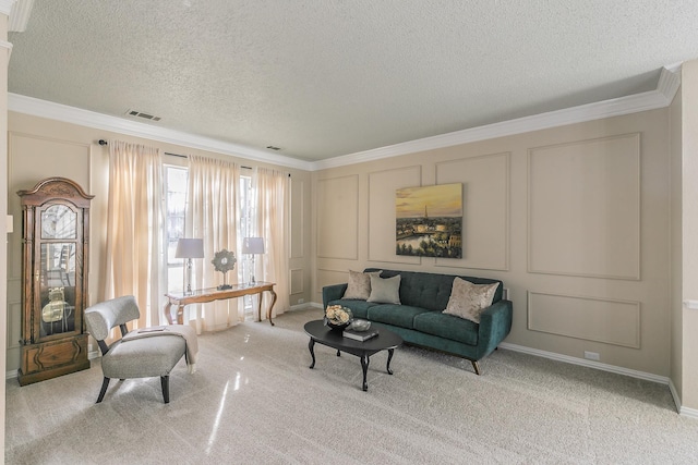 carpeted living room featuring a textured ceiling and crown molding