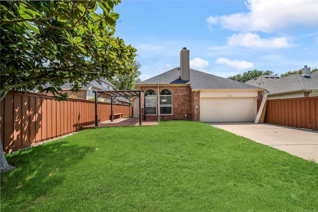 view of front of property featuring a garage, a front yard, and a pergola