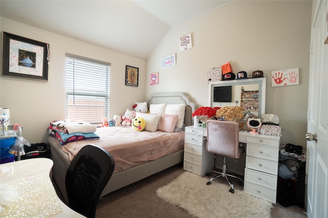 bedroom with carpet flooring and vaulted ceiling