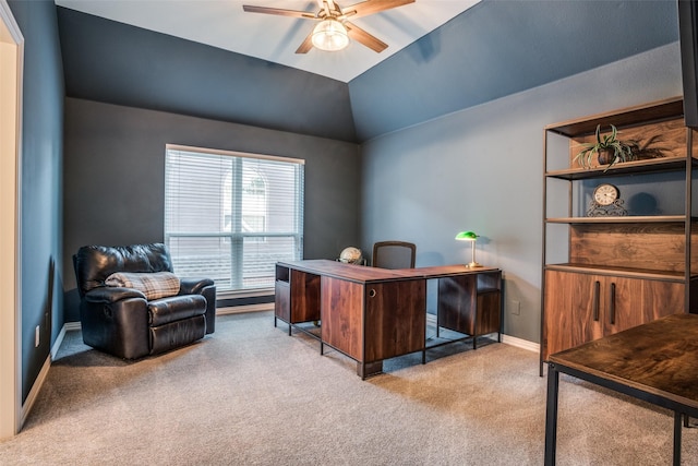 office area with ceiling fan, light carpet, and vaulted ceiling