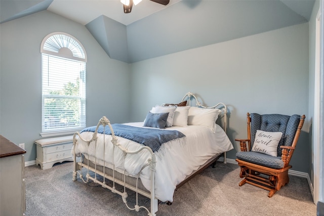 bedroom featuring ceiling fan, lofted ceiling, and carpet flooring