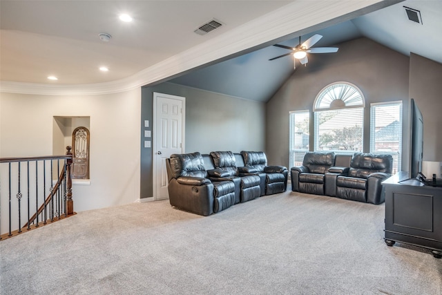 carpeted living room with ceiling fan, crown molding, and lofted ceiling