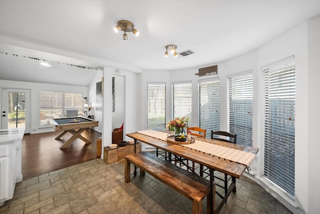 dining room featuring billiards and a healthy amount of sunlight