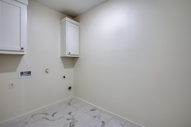 laundry area with cabinets, hookup for a gas dryer, hookup for a washing machine, and electric dryer hookup