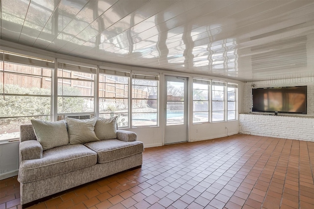 sunroom featuring a wealth of natural light