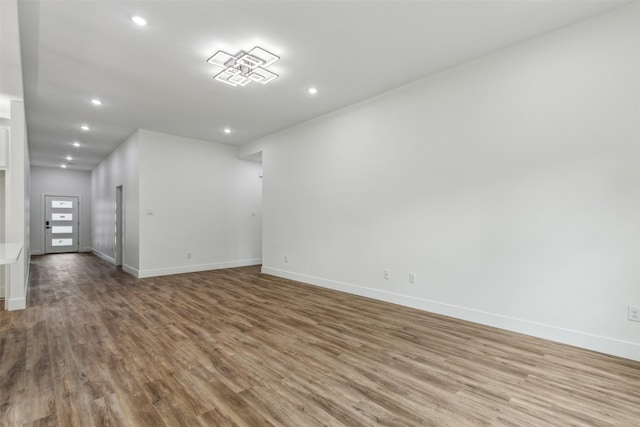 unfurnished room featuring hardwood / wood-style floors