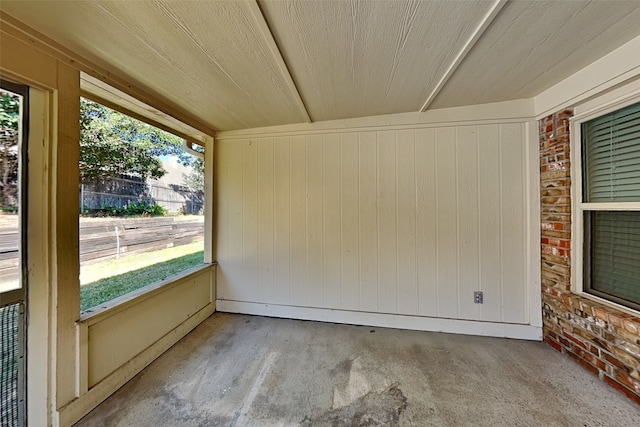 unfurnished sunroom with a healthy amount of sunlight