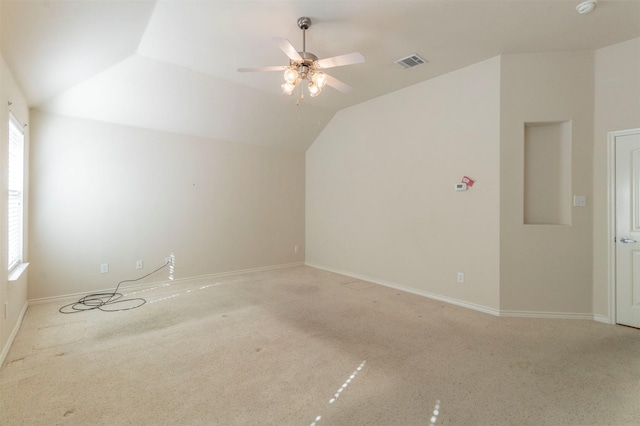 interior space featuring ceiling fan and lofted ceiling