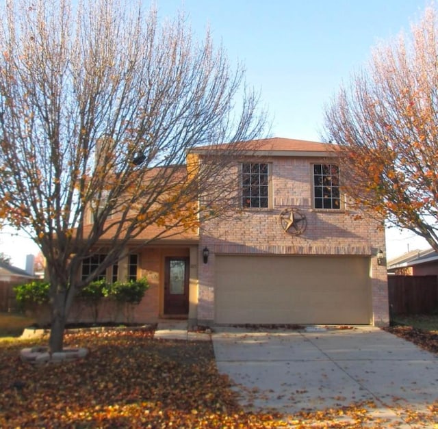 front of property with a garage